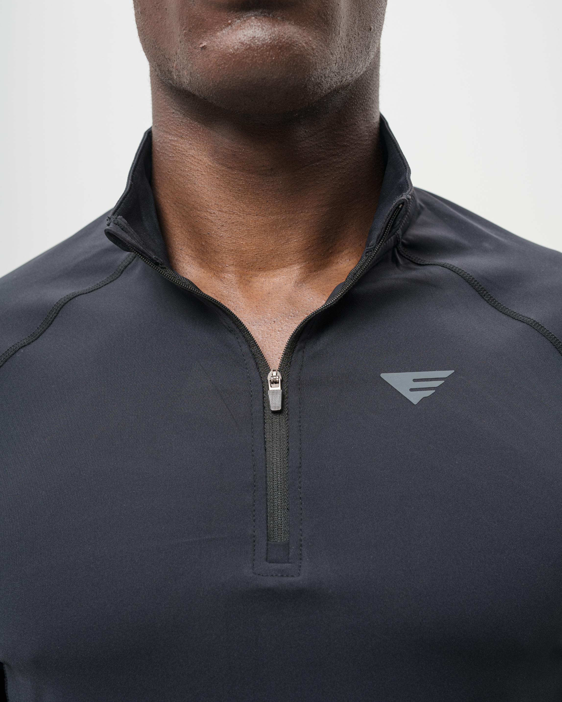 Black Longsleeve Quarter Zip neck close up